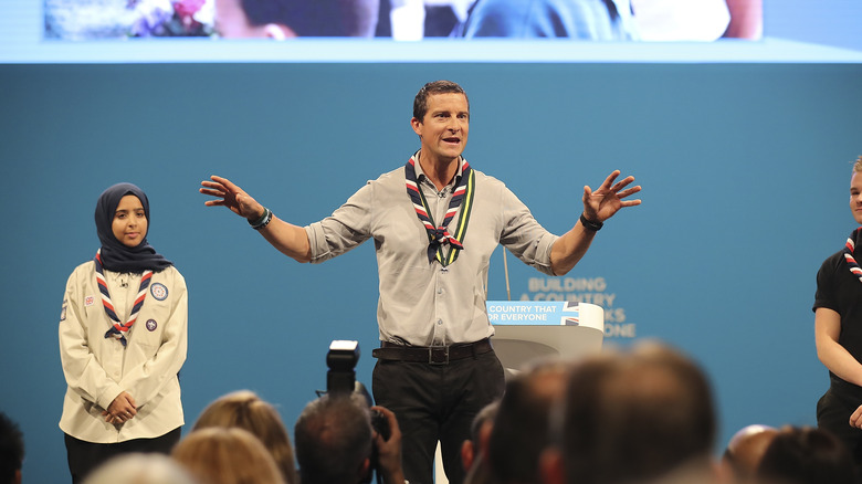 Bear Grylls speaking to an audience