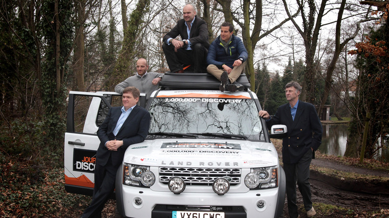 Bear Grylls, Ray Mears, and other survivalists with a Land Rover