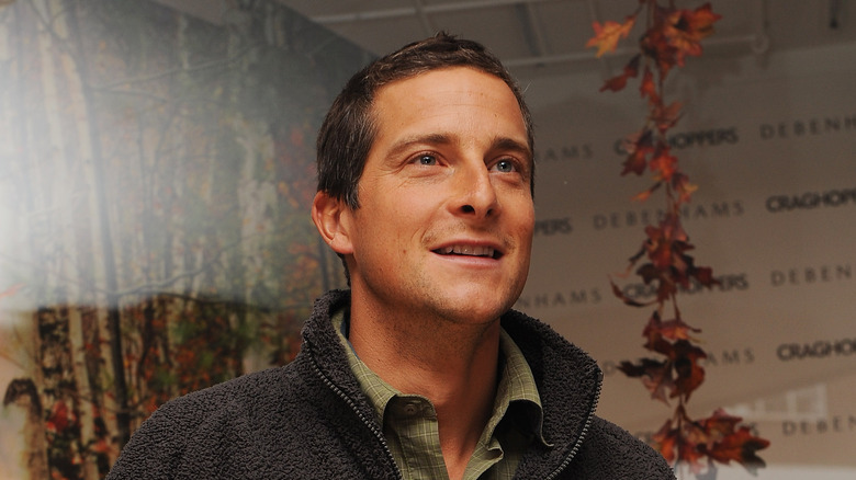 Bear Grylls looking up