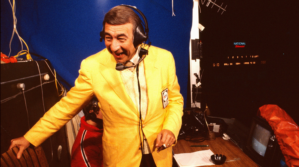 Howard Cosell in yellow blazer