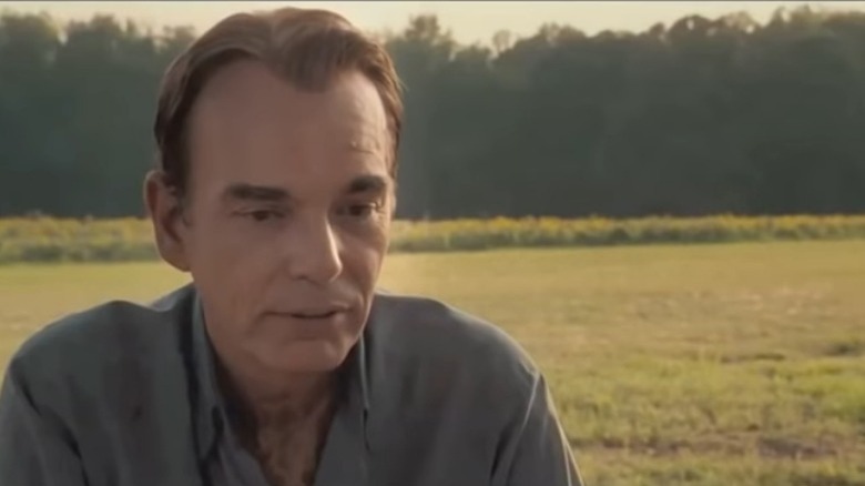 Skip Caldwell standing in empty field