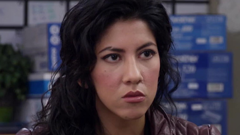 Stephanie Beatriz glares