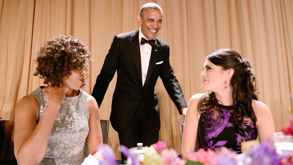 Barack Obama smiling at Cecily Strong