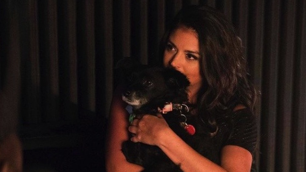 Cecily Strong cuddling with her dog