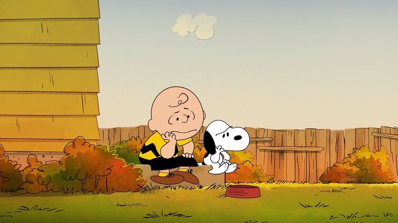 Charlie Brown and Snoopy contemplating