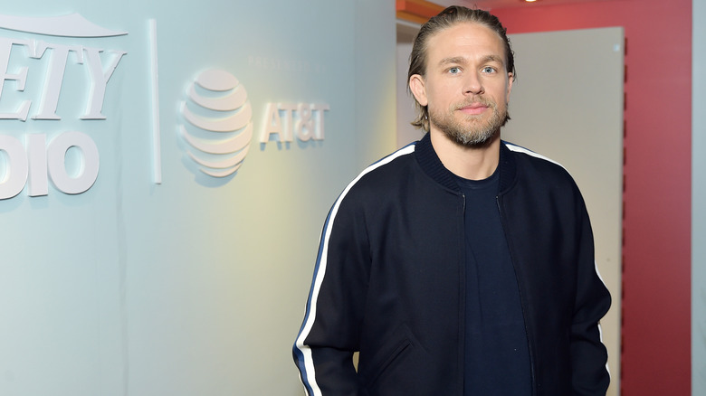 Charlie Hunnam looking dejected