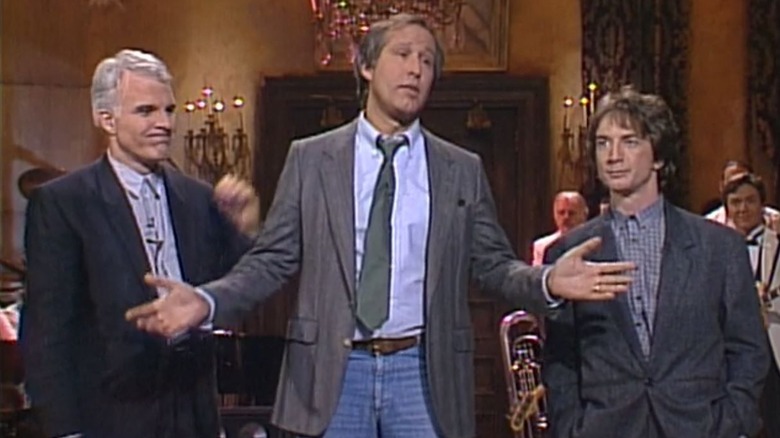 Chevy Chase opens arms on SNL stage