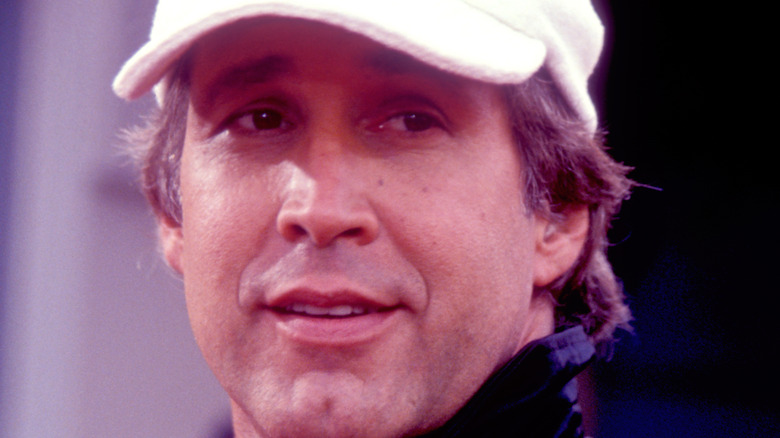 Younger Chevy Chase looks to side