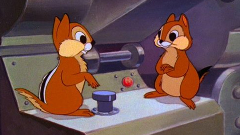 Chip and Dale standing on top of machine