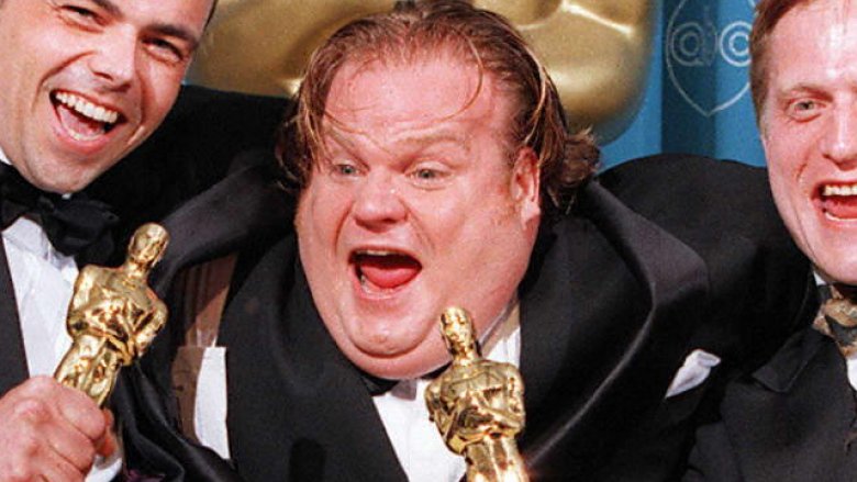 Chris Farley holds awards