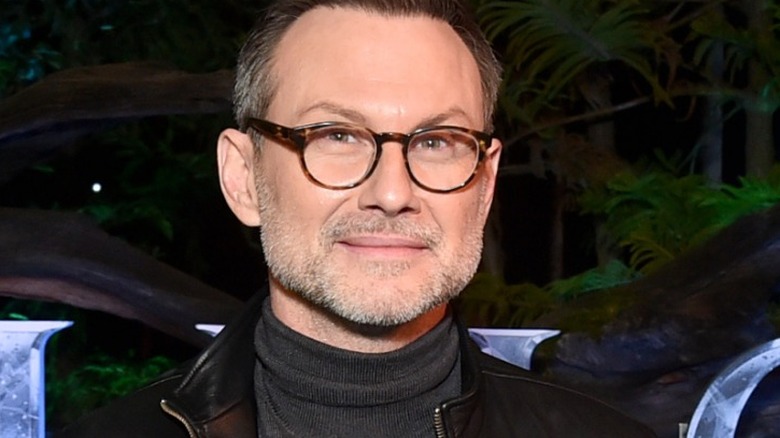 Christian Slater wearing glasses