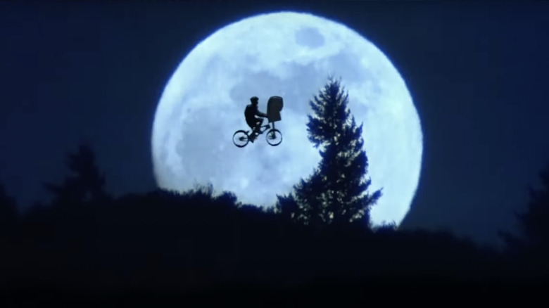 E.T. The Extra-Terrestrial flying bike across moon