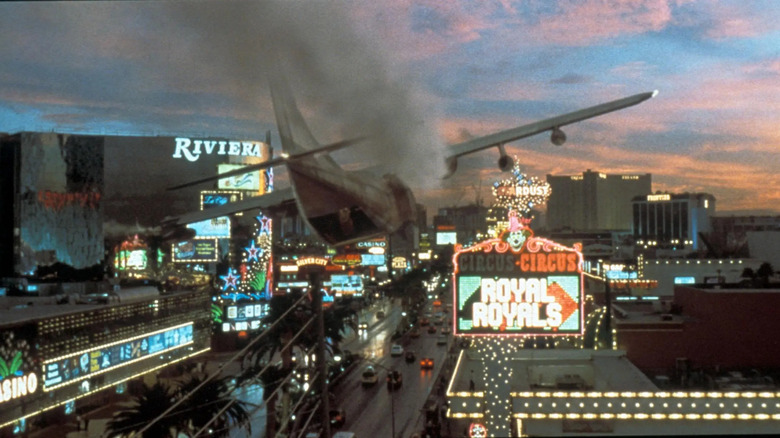 Smoking plane flying over Las Vegas strip