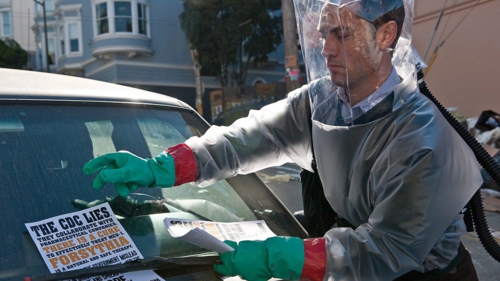 Jude Law as Alan Krumwiede in Contagion