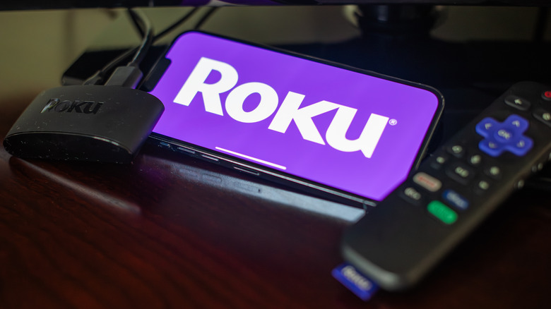 Phone showing Roku logo