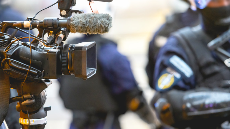 TV camera next to Cops