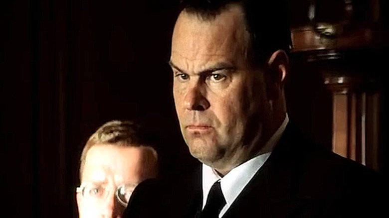 Dan Aykroyd looking stern in close-up Pearl Harbor