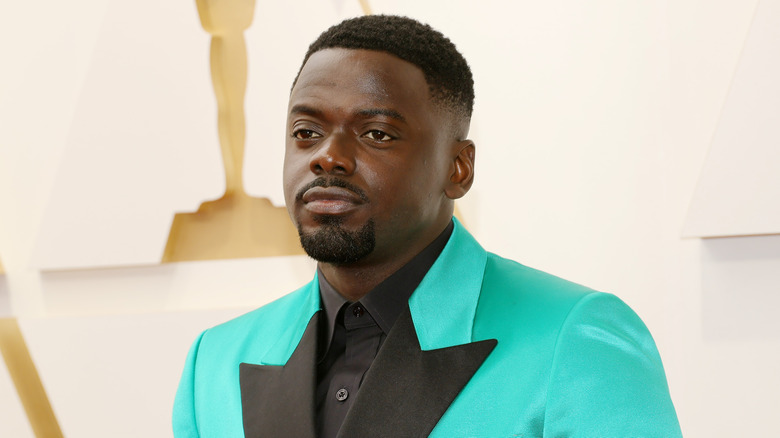 Daniel Kaluuya in neon turquoise suit