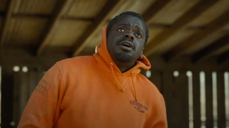 Daniel Kaluuya looking up