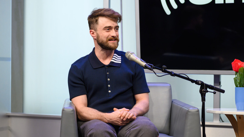 Daniel Radcliffe speaking into mike