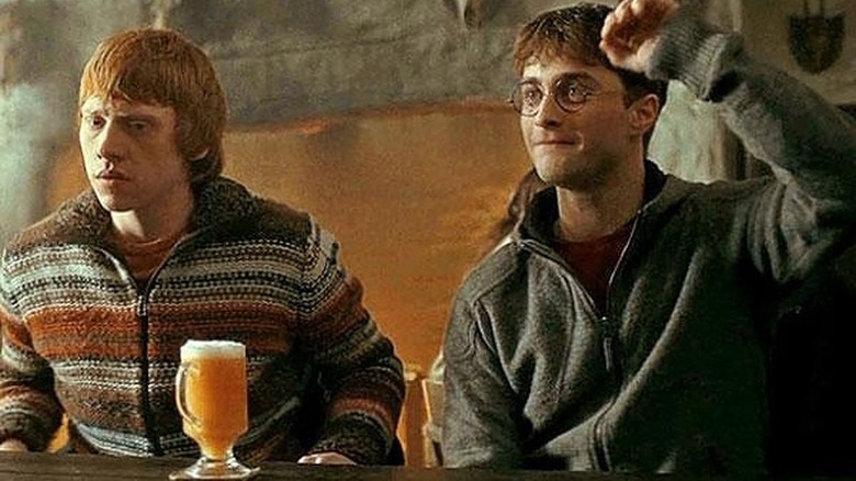 Harry and Ron drink butterbeer