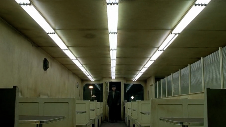 Man stands in automat doorway