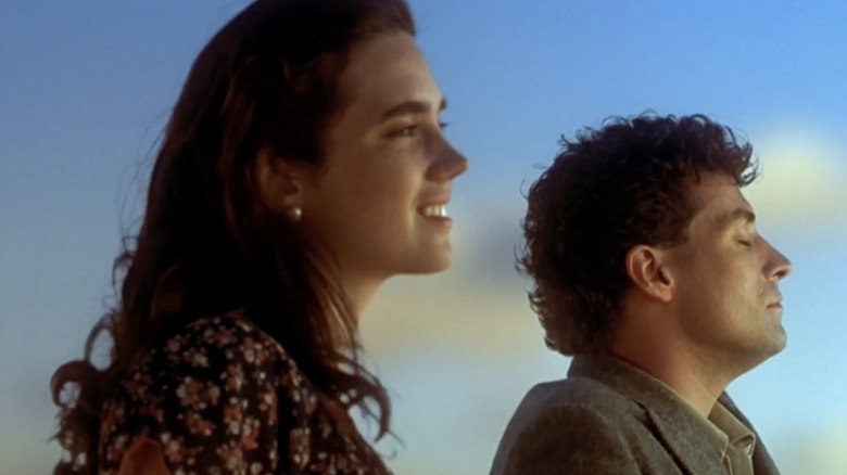 Jennifer Connelly Rufus Sewell look out at horizon