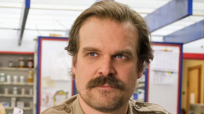 David Harbour staring