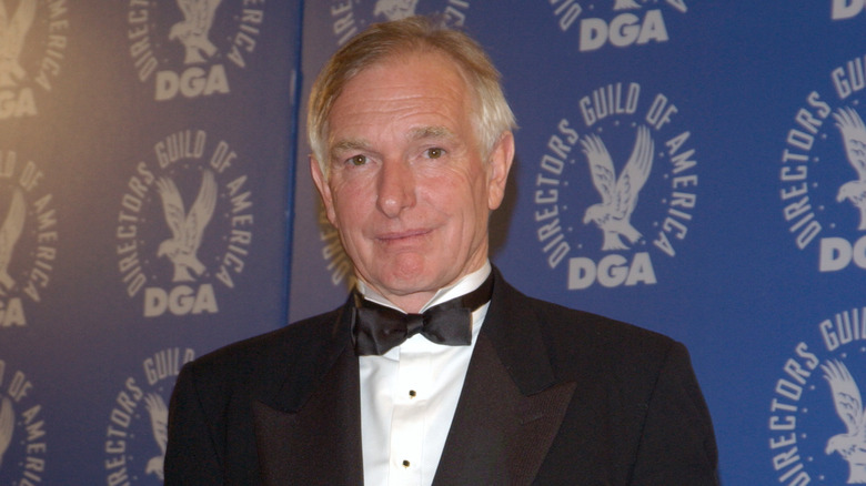 Peter Weir posing on red carpet