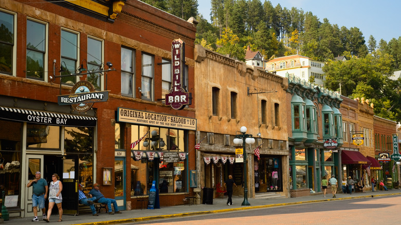 Tourists walking the streets of Deadwood, SD