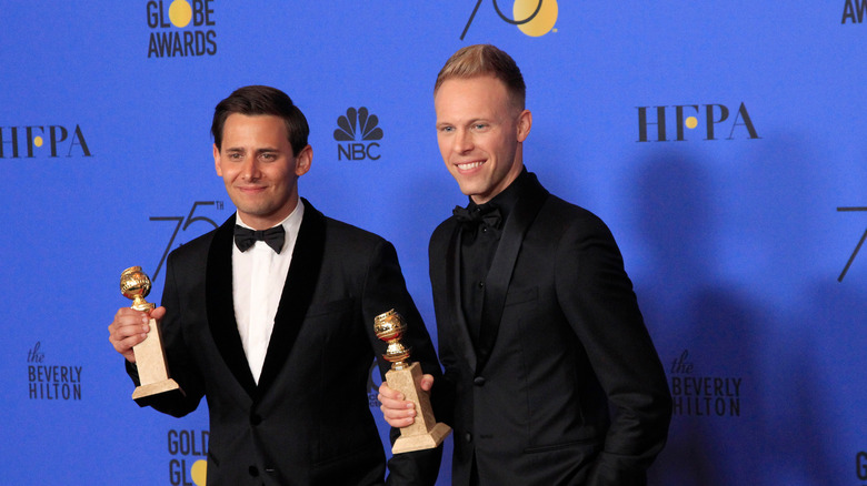 Pasek and Paul clutching awards