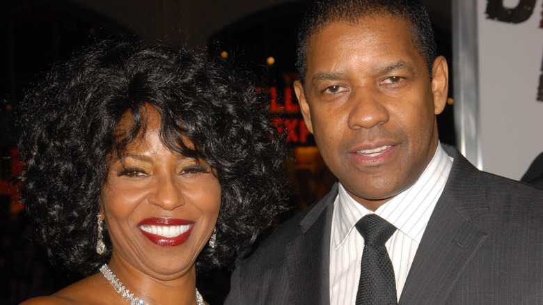 Denzel Washington and Pauletta Washington at Book of Eli premiere