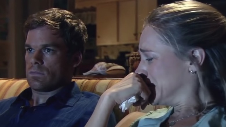 Michael C. Hall and Julie Benz watch TV on Dexter