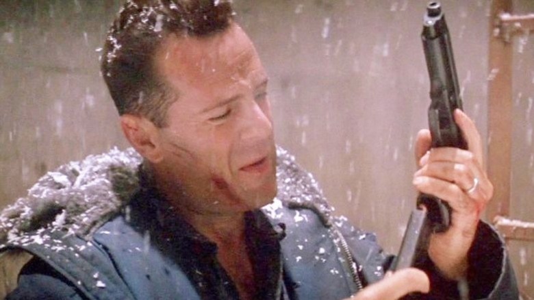 Bruce Willis in Die Hard 2 with a gun