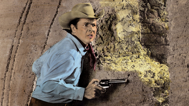 Audie Murphy playing a cowboy