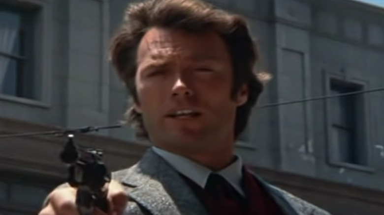 Clint Eastwood holding a gun