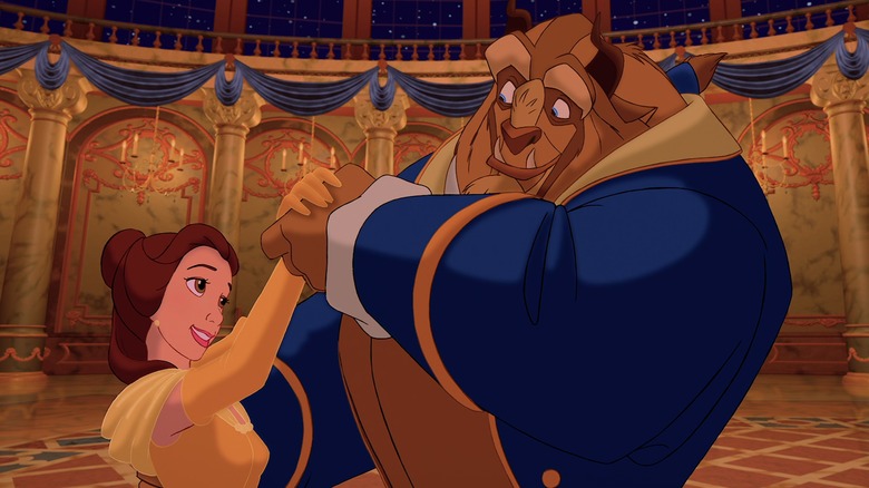 Belle and Beast dancing in ballroom