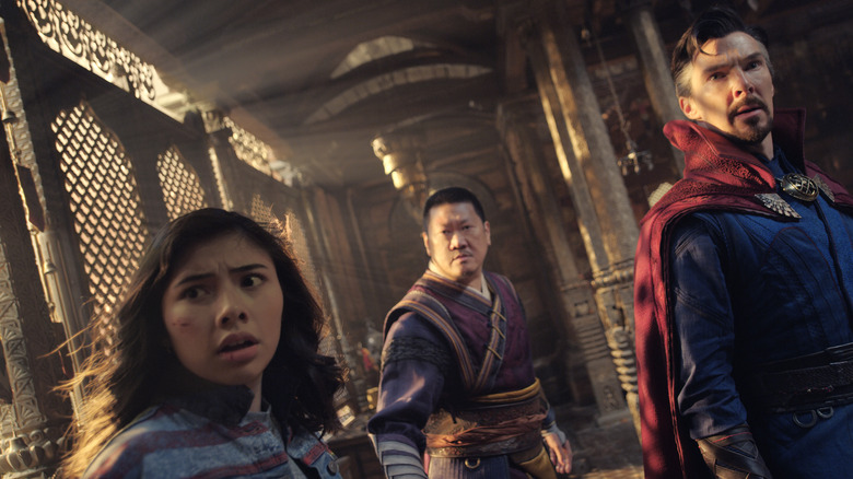 Xochitl Gomez, Benedict Wong, and Benedict Cumberbatch standing in disbelief