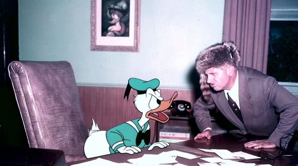 Donald Duck and Clarence Nash in "A Day in the Life of Donald Duck"