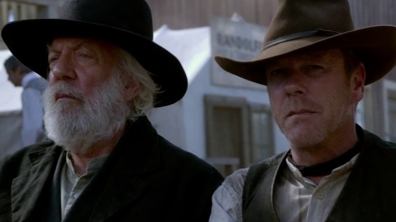 Donald Sutherland as Reverend Clayton and Kiefer Sutherland as John Henry Clayton