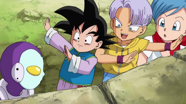 Goten and Trunks show Jaco and Bulma a pose