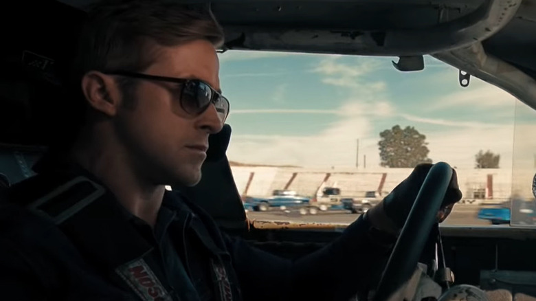 Ryan Gosling driving at racetrack