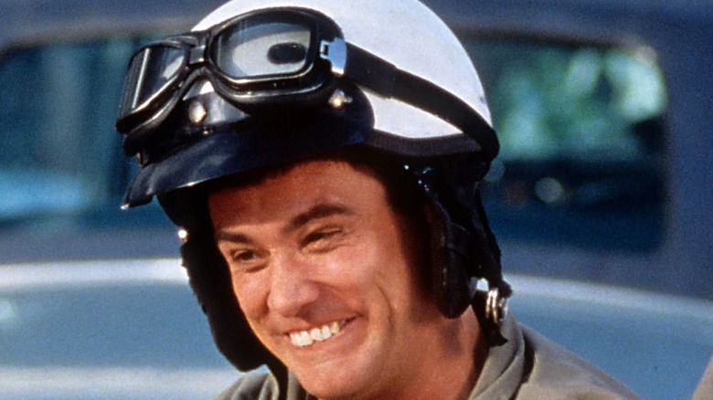 Lloyd smiling in a motorcycle helmet