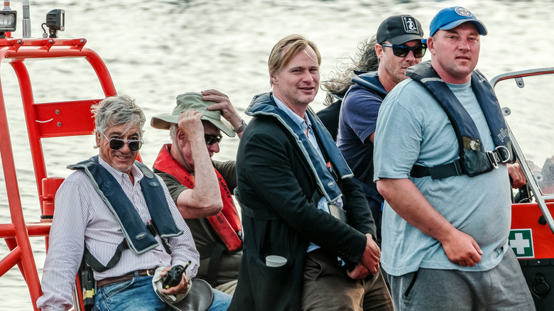 Christopher Nolan on a boat with film crew