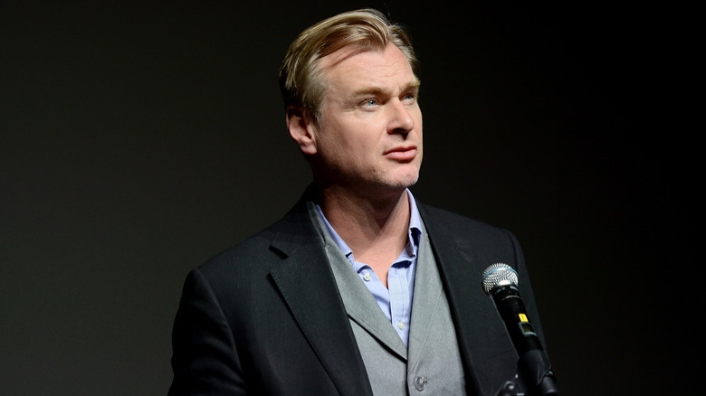 Christopher Nolan looking up at audience