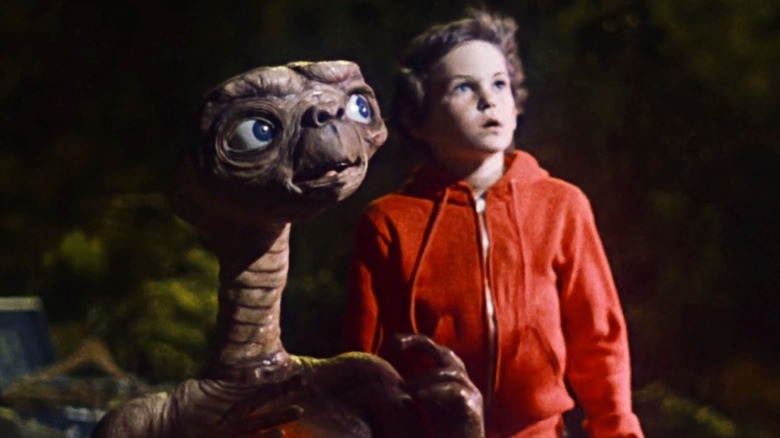 E.T. and Elliott look at spaceship