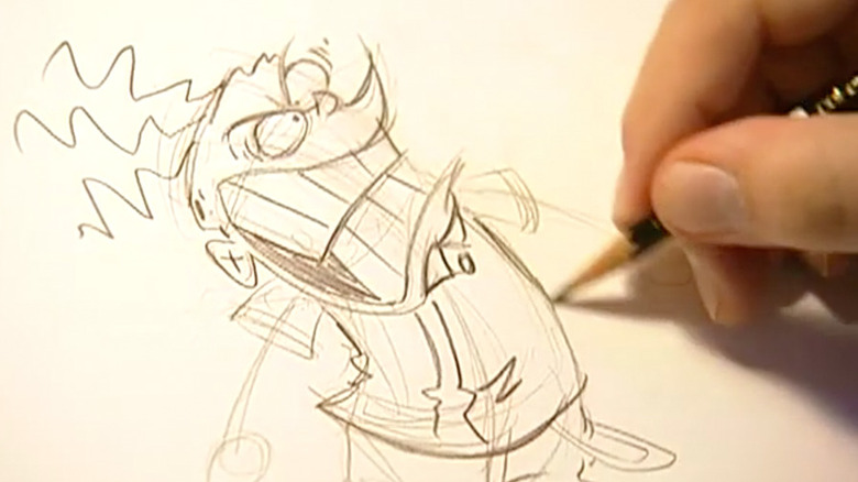 An animator showing how to draw Eddy