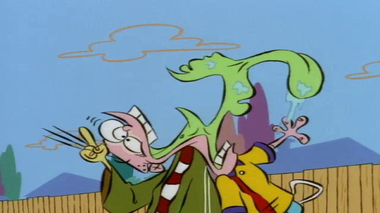 Ed shoves his head into Eddy's mouth