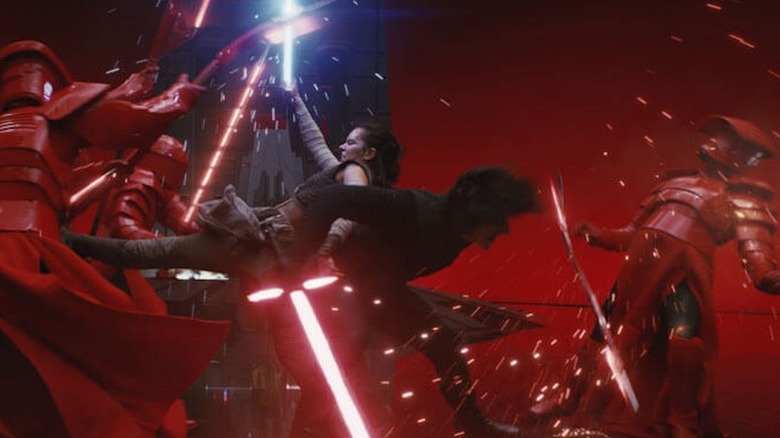 Rey and Kylo in an intense fight