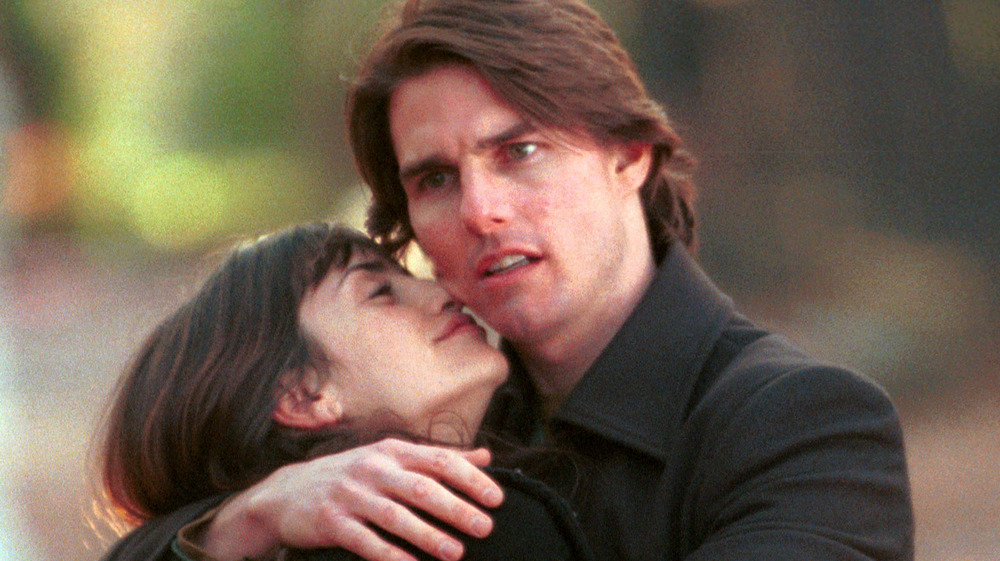 Tom Cruise holding Penelope Cruz